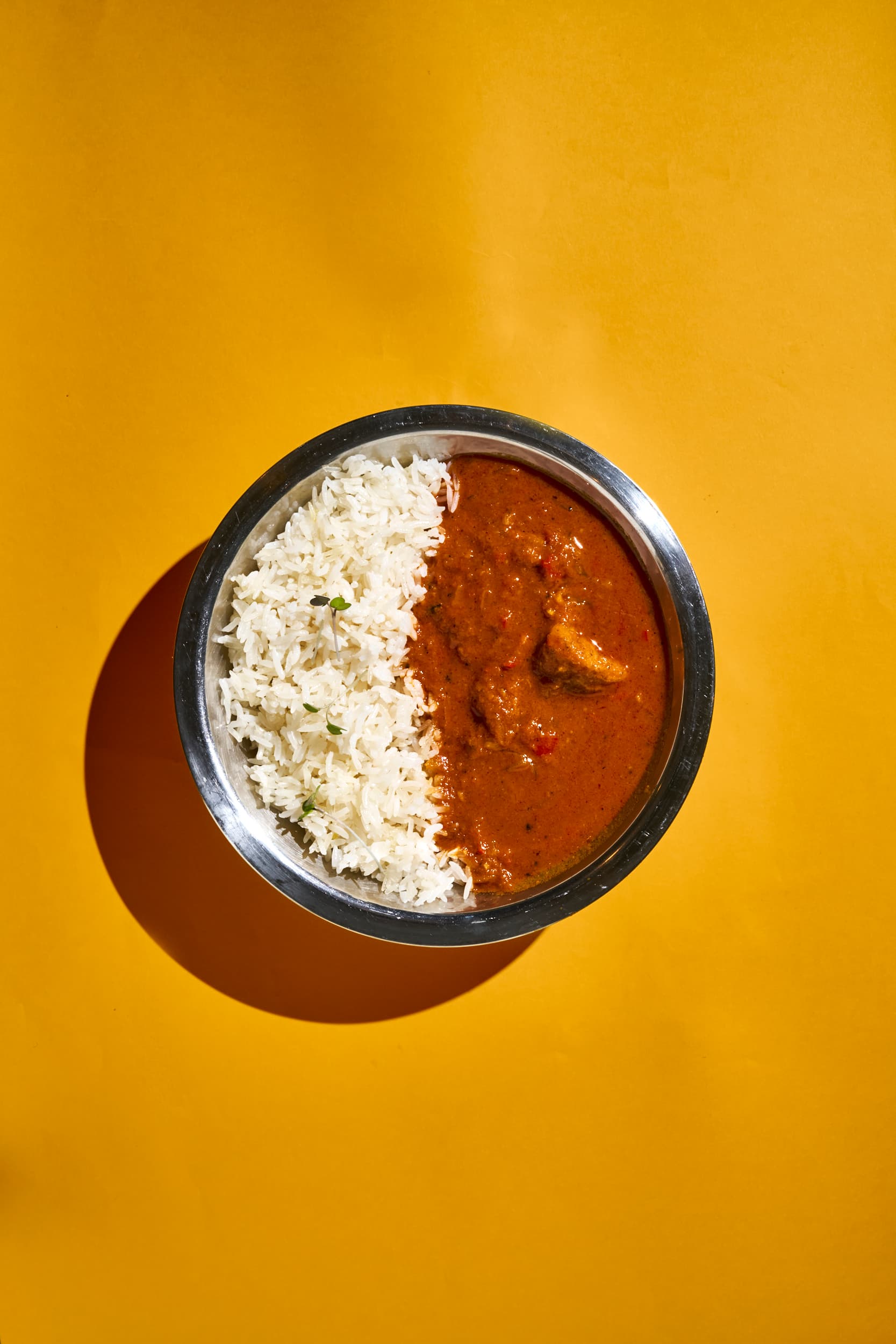 Kondre: plantain stew in curry sauce with white rice